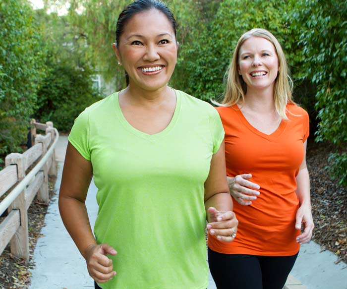 Two women walking photo