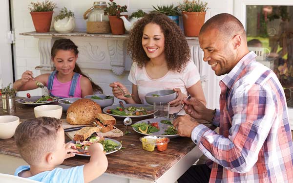 Family having dinner together photo