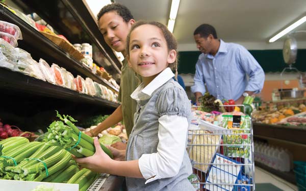 Family grocery shopping together photo