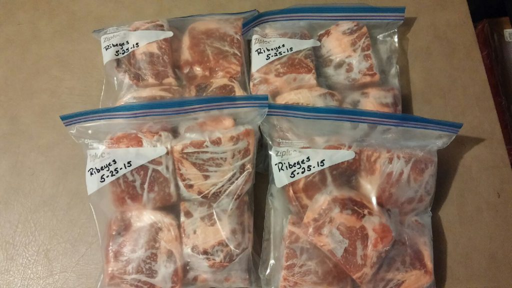 Ribeye steaks packaged and labeled and ready for freezing.