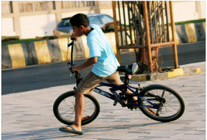 child riding bike