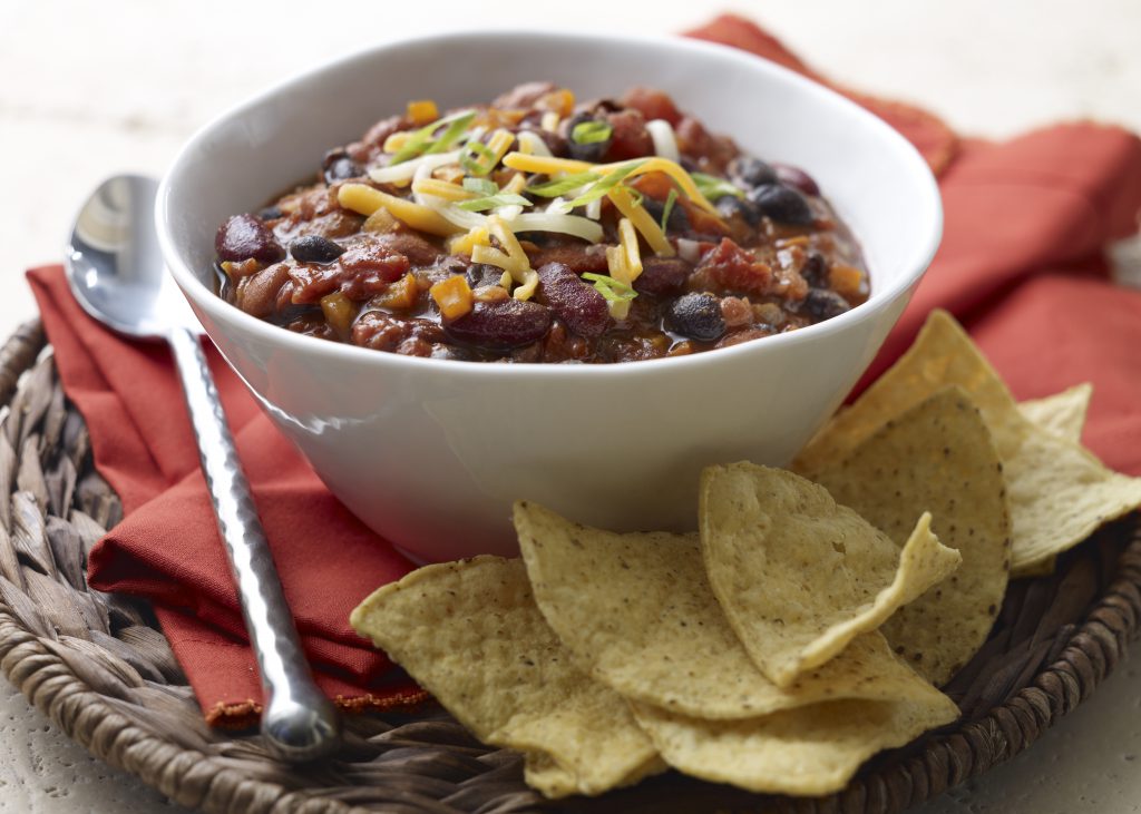 bowl of chili with chips