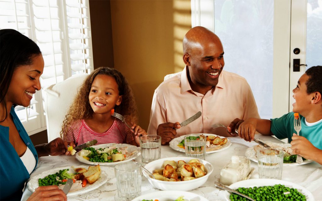 family eating a meal at the table