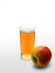 cup of apple juice and apple