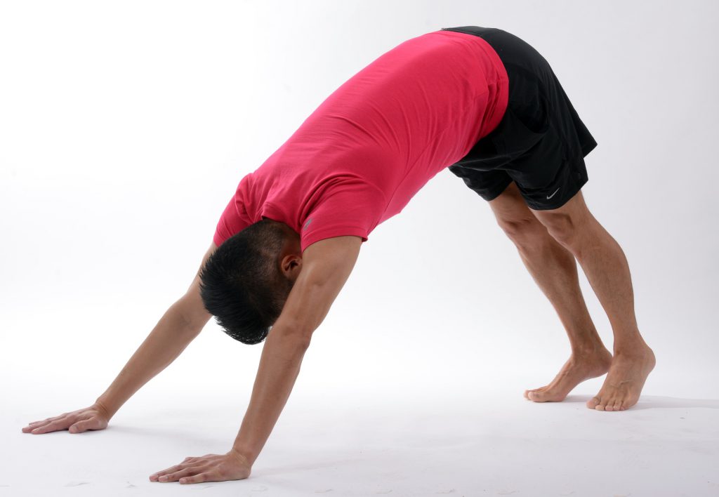 man doing yoga pose