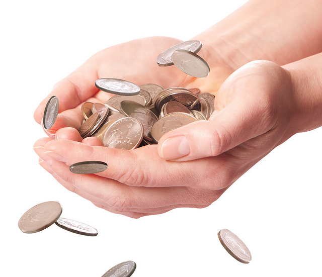 hands handling coins 