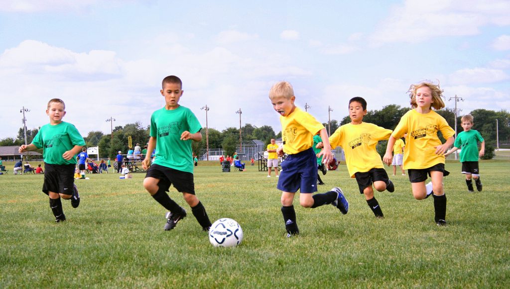 youth playing soccer