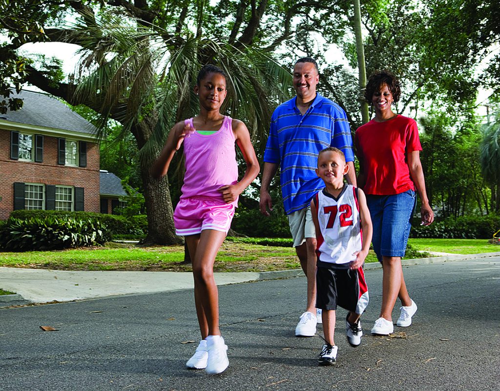 family walking outside in the street