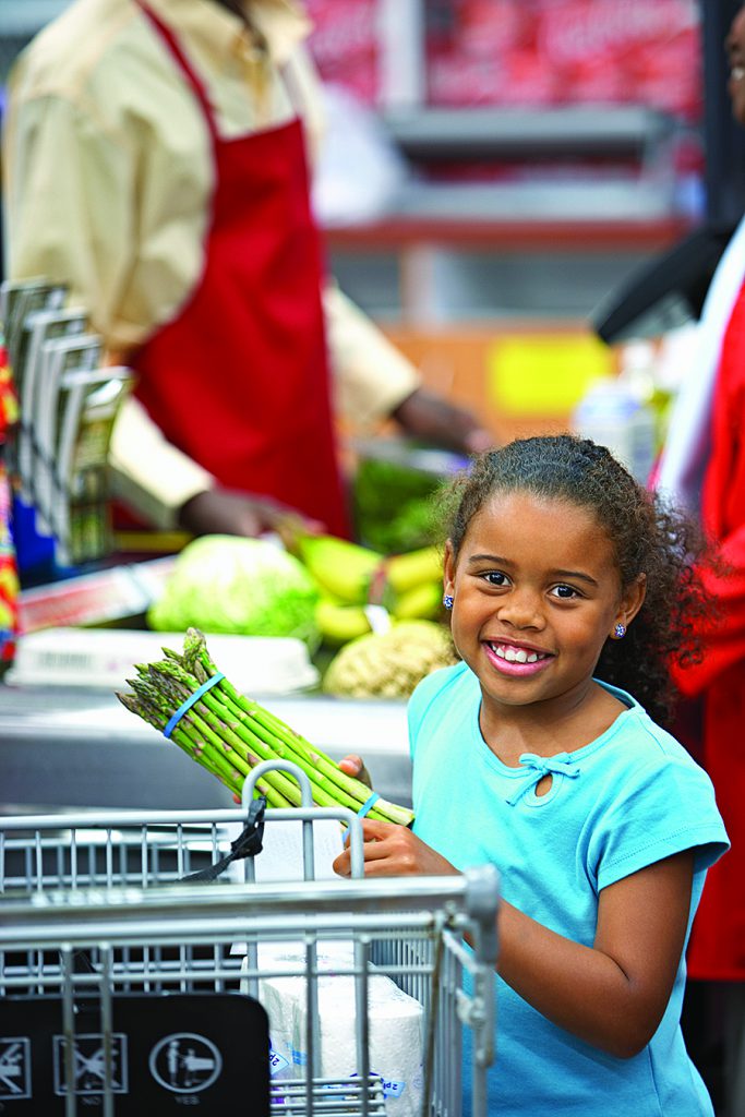 child in grocery store